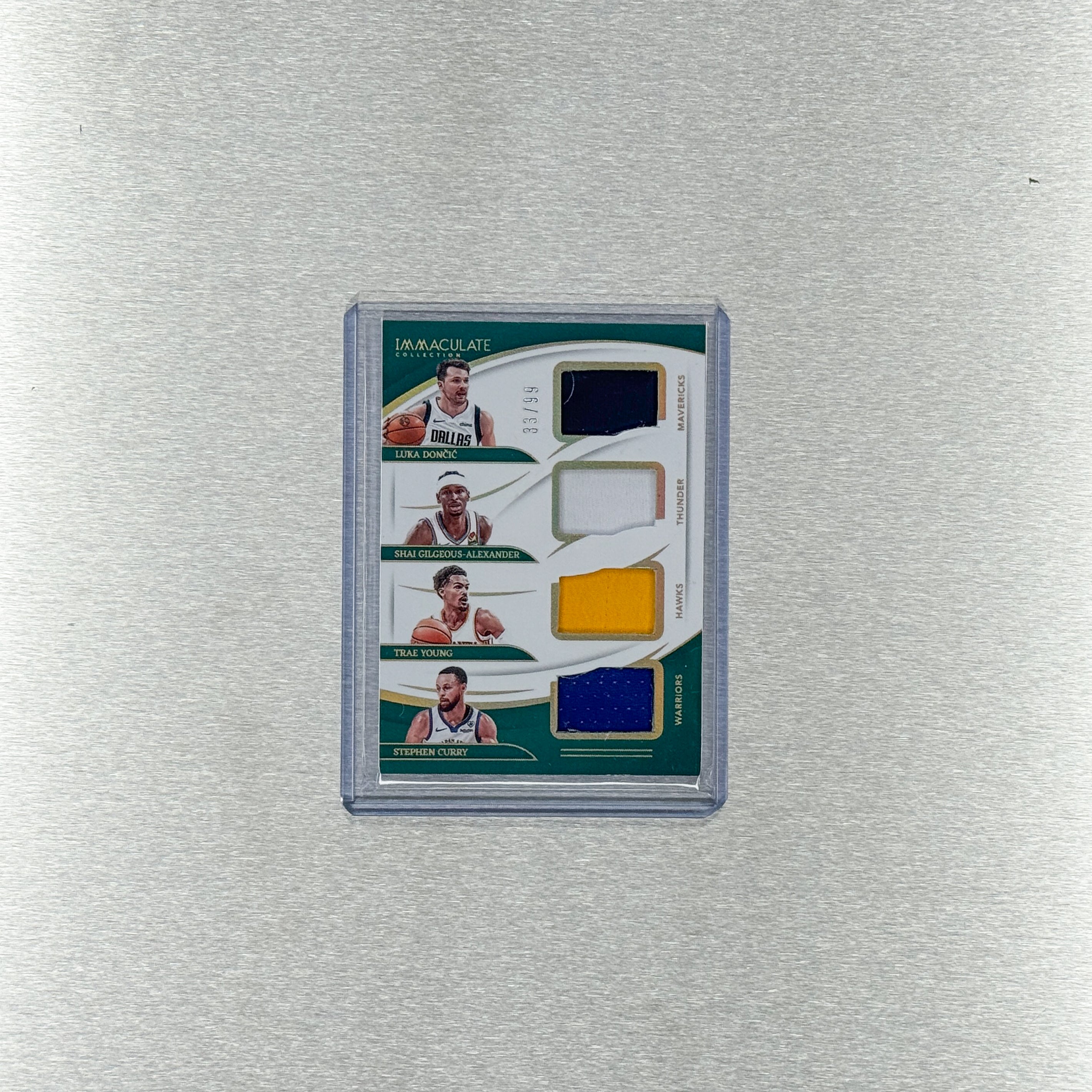2023-24 Panini Immaculate Basketball – Immaculate Quad Mem - Trae Young / Shai Gilgeous-Alexander / Stephen Curry / Luka Doncic 33/99